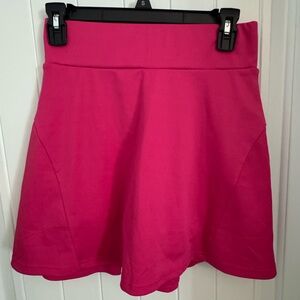 Women’s werena pink skort. Size medium. Pink skort. Back pleated